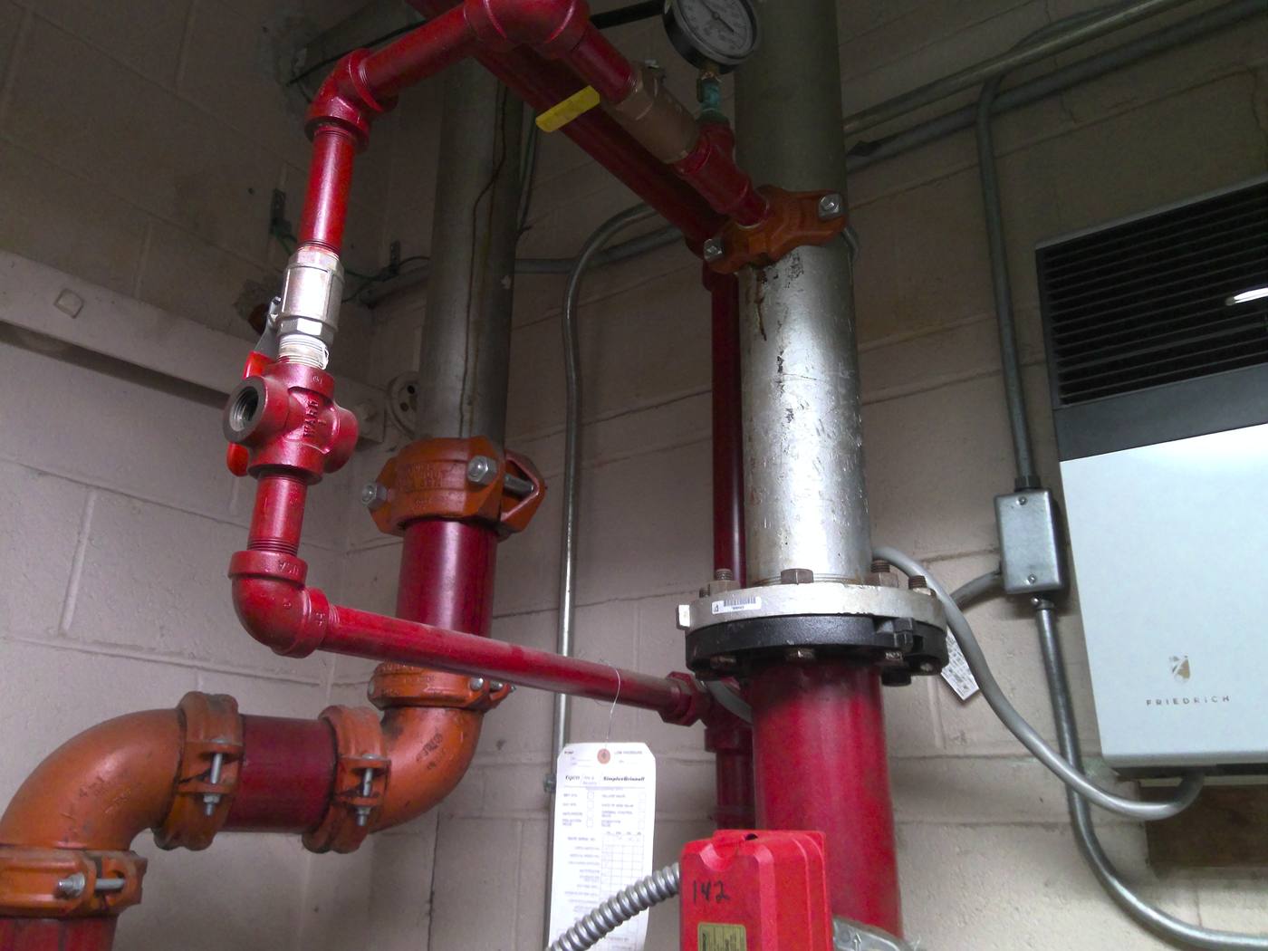 Sprinkler riser and valve assembly