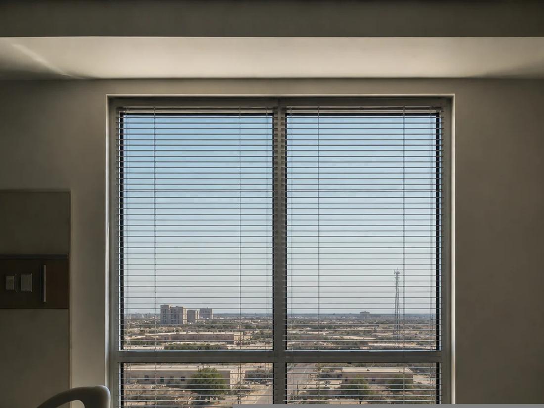 Illustrative photo of an aluminum window frame with double glazing