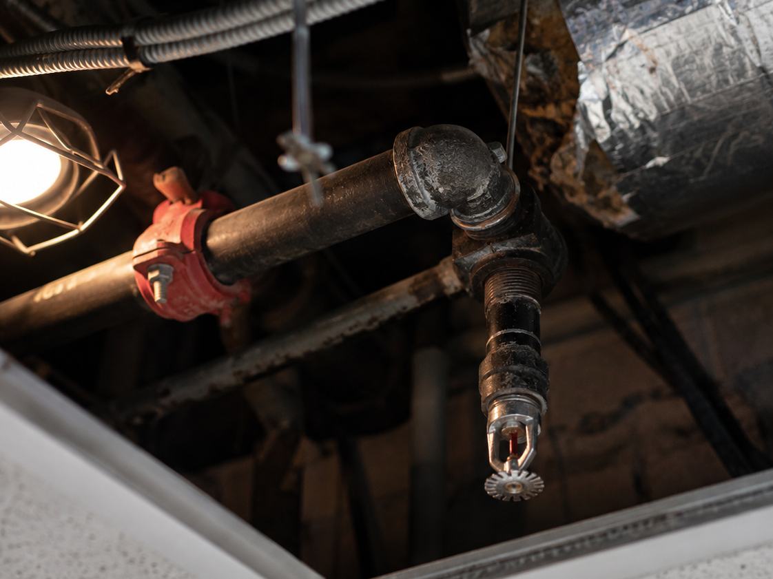Illustration of sprinkler piping above a ceiling
