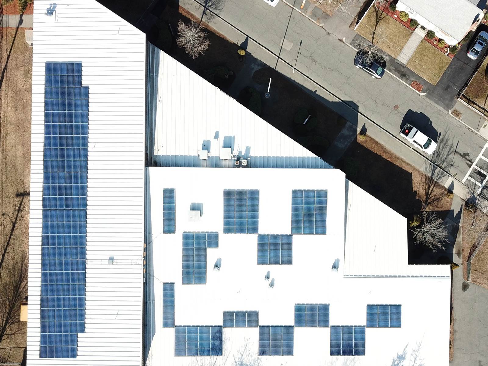 Aerial view of rooftop solar panels on a VA campus building